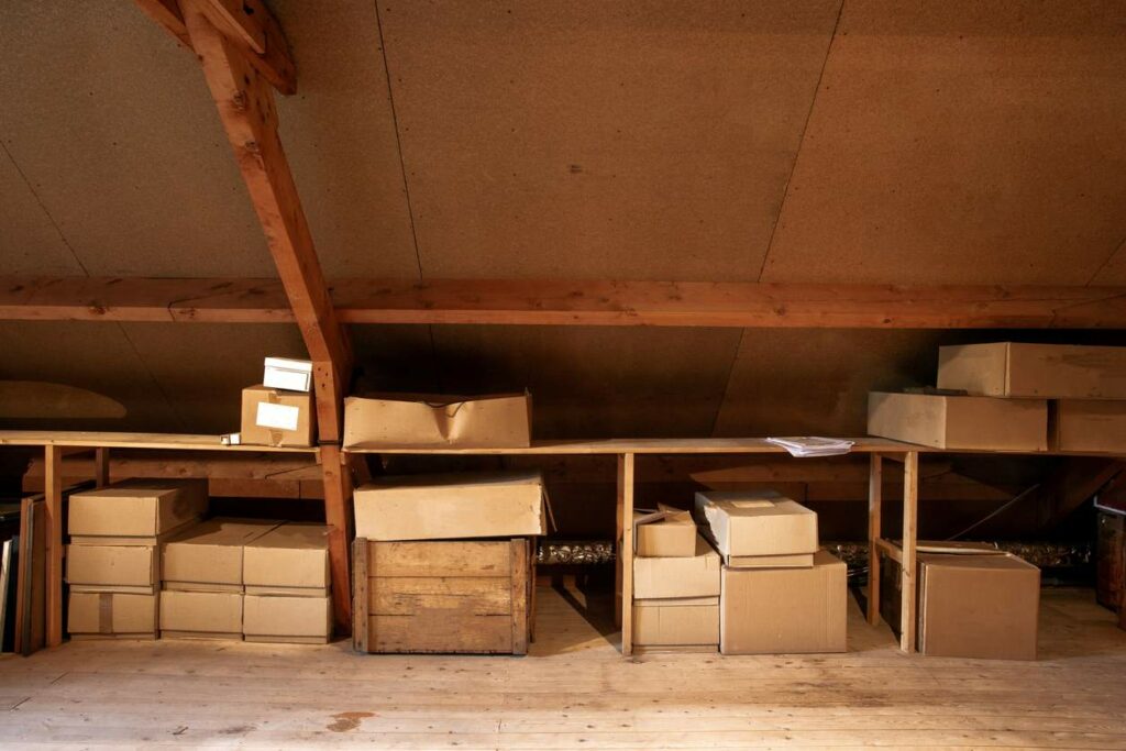 An attic full of cardboard boxes